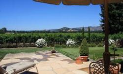 Fabulous views! Set on the valley floor on just over an acre is this stunning Mediterranian home, located just south of Yountville. Included with the beautiful landscaping are 500 Cabernet vines, a Guest Cottage and a additional Guest Suite above the