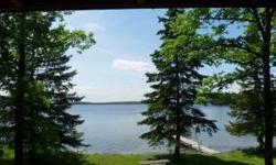 Buy as a resort rentals, family retreat or a large tract of land to build your dream home on Potato Lake. 888+ sand beach, panoramic view, 8 Cabins, Tri-plex & 3 bedroom home. 24+ acres offering privacy & a chain of 3 lakes.Listing originally posted at