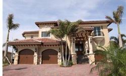 A magnificent Mediterranean style home situated on the end point of prestigious Brightwater Beach Estates in St. Pete Beach with 147 feet on Boca Ciega Bay and panoramic water views. Built in 2009 of all concrete block and steel perched atop 89 pilings, t