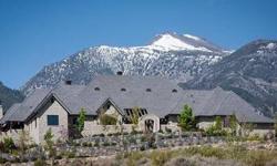 Located on 1.02 acres perched high atop a ridge overlooking number 3 practice holes in Montreux. This single story retreat boasts towering windows that showcase unsurpassed views of Mt. Rose. This one-of-a kind residence offers expensive covered stone