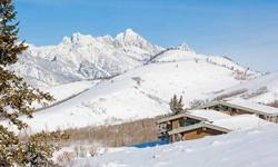 Perfectly situated atop West Gros Ventre Butte in the Gros Ventre North subdivision, this comfortable home offers sweeping views of the entire Teton Mountain Range and the west bank of the Snake River valley. Designed by renowned mountain architects Arne