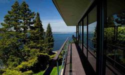 Remarkable property with big lake view from almost every window. Stunning sunset views over the Olympic Mountain range. The home won several architectural awards and has been lovingly maintained. A fine example of Mid-century Modern. Over half an acre of