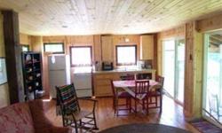 Rare opportunity to own paradise. One of a kind property features over 816' of prime sandy Lake Michigan shoreline with 58 rolling acres, a mix of towering hardwood forest and bucolic pastureland. Log home with lovely views of Lake Michigan and