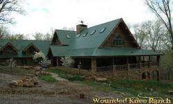 Where the deer and the buffalo roam...200 AC +/- farm/ranch fronting 2 sides of the White River. 3 homes including extraordinary 3 level 9,550 square foot stone & log fortress on forested site. 95% complete, can choose finish out w/full offer. Green built