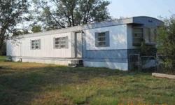 For sale is (2) single 14' wide Mobile Homes on a half city block or (4) Lots. The mobile homes need repairs and any handyman can repair them to live in or rent/sell. Also If your interested in just the mobile homes and intend to move them to a new