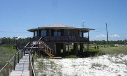 Wonderful home on the serene and beautiful beaches of Dog Island, located just off the coast of Carrabelle, FL. This is truly a one-of-a kind retreat accessible by boat, passenger ferry or airplane. This beautiful and comfortable, beachfront home features
