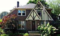 Beautiful and Stately this Tudor style Colonial is now available for you and your family! Four bedrooms and 2.5 baths gives you plenty of room to live, laugh, and love...but there's so much more! Charming fireplace, gleaming natural woodwork, gorgeous