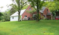 2 story Brick,w/fields, lots of fruit trees,1/4 mile black top road frontage,two gardens