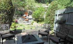 Terrific townhouse w/tranquil patio rock garden $300k! Listing originally posted at http