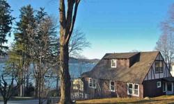 Outstanding Year-Round Panoramic Lakeviews & Sunsets from this Original 1927 Arthur Crane Log Home located on a Double Lot Across From The Lake Mohawk Marina. 3 Bedrooms, 2 Baths, Formal Dining Room, Office/Den, Enclosed Porch, Rear Flagstone Patio,
