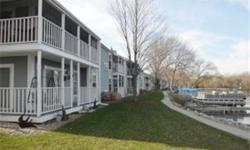 Lower level condo, only 10 steps to your boat slip! Great views of main waterway! Two nice sized bedrooms with 2 full baths. Updates include hardwood floors, new carpets and ceiling fans! Appliances included. Sliding doors to an extra wide porch leads