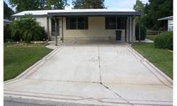 SELLER FINANCING-LEASE OPTION AVAILABLE FOR THIS 2/2 WELL MAINTAINED WELLINGTON MODEL MOBILE HOME WITH CHAIN OF LAKES ACCESS. OPEN SPLIT PLAN WITH ENCLOSED FLORIDA ROOM WITH A WONDERFUL VIEW OF THE POND. BUILT IN DINING ROOM HUTCH WITH EAT IN KITCHEN.