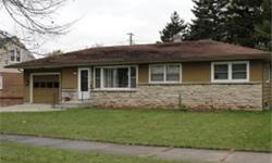 Great south side location for this classic 3 bedroom ranch. Newer furnace, central air. Nice sized living room with a large picture window in front. Natural wood trim, hardwood floors in the bedroom. Lower level has rec room potential with a bar already