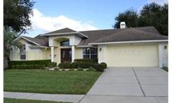 Picture perfect home in Oviedo. This property has been lovingly maintained w/beautiful appointments throughout. This 4 bedroom 2 bath Chatham model boasts an open floor plan. Both the living room and family room open to the beautiful covered lanai and