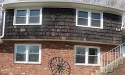 Well built split in beautiful location so close to town and Rt 25 for easy commute. See Long Island sound on a clear day!Listing originally posted at http
