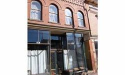 An incredibly unique opportunity to own a part of Colorado history. This property is located in the resurgent downtown district of Victor. The building has been updated and could be functional for many uses. Live in one part and rent the other. Minutes