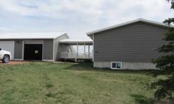 Take a look! This large ranch style 4 bedrooms, 3.75 bathrooms, walk out basement, and 34'x30' garage is a MUST SEE! Located close to town on 1.8 aces with a great view of the Big Horns.
Listing originally posted at http
