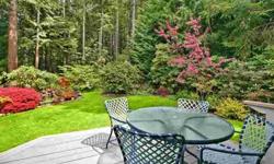 Welcome to the secret garden. This fantastic 3 bed, 2.5 bath home features grounds & gardens that you have to see to believe. Gorgeous Asian style landscaping, green lawn, garden beds & a shady deck paint the scene in your northwest getaway. Inside an
