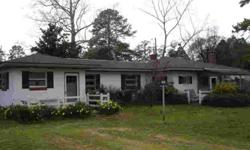 Southern rancher located on "Put-In-Creek" only 1/2 mile from Mathews village for easy convenience. Small pier that could be extended. Town Point boat landing/ramp minutes away. Two/three bedroom or office, 2 baths, large living room with fireplace, sun