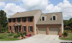 Amazing home sitting on 1.64 acres w/ gorgeous views. 4BR, 2.5 BA w/ formal living and dining rooms. Lg eat-in kitchen w/ breakfast bar, raised panel cabinets & appl's included. French doors lead to rear deck. Family Rm is opened to kitchen, great for