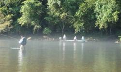 WORLD CLASS TROUT FISHING- WADE or BOAT Fishing in your own Back Yard!!! Located in Cotter, Arkansas (Trout Capital USA) TRULY a Fisherman's Paradise!!! !00 foot of river frontage.Maintanance free home in Excellent condition.Sits on 1/2 acre. Some of the