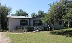 HUD owned property, offered "AS IS" with all faults ~ HUD case # 492-819191 ~ 5 Bedroom / 2 Bath Double Wide on a Level Lot Near Lake Belton ~ Nice Oak Trees ~ Covered Patio ~ Storage Shed ~ Move in Ready!