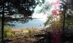 Check out this 1 acre lake front lot just minutes from #9 Marina and Park! Sandy beach cove. Great swimming and fishing. Lot has over 149 feet of shoreline. Lot is restricted to homes only with a minimum buiding square footage of 1,200. Quiet location.