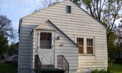 This sturdy little home just needs some TLC to finish the fix up/ clean up and be very livable! Some of the rehab has been done. The large basement needs cleaning up but has lots of possibilities for use - The chimney needs some repair and the garage