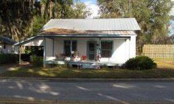 Adorable and affordable!! This 1915 cracker style house is located smack dab in the middle of beautiful nw marion county "horse capitol of the world". Ocala Marion County Association of Realtors has this 1 bedrooms property available at 7795 W Highway 316