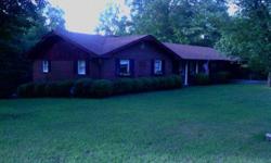 All brick ranch on 5.95 acres. 3 outbuildings 2 with electricity, water, and phone hook ups. Large detached garage can hold a pontoon and has an automatic door opener. Large bedrooms, brick fireplace. Large mudroom. New roof in 2010. GA power property