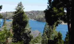Vintage Lake Arrowhead charmer, located in the Palisades area, with dramatic views of the lake from almost every room. This cottage boasts 2 bedrooms and 1.5 baths, plus additional bath in workshop/3rd bedroom/laundry area on lower level. Features include
