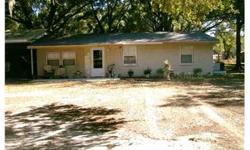 Are you looking for a home in a great location . . . You can have your horses and bring all your toys without paying for storage? Well here you go! This lovely 3 bedroom home is nestled under the trees on 2.5 acres of land. Interior has been remodeled and