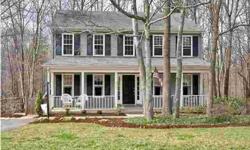 Set against a wooded backdrop mins from UVA medical center & downtown Cville, this spacious colonial offers the best of everything. Features