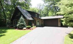 This beautiful home is impeccable! It boasts of quality and class. Is situated on a quiet, wooded, private lot w/ convenience to 1-43 and I-90. Updates include a gorgeous kitchen, private master suite and inviting great room w/full wall fireplace. There's
