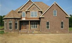 Almost finished. Master suite on main floor w/sitting room, whirlpool tub, tile shower, his & her closets. Greatroom w/fireplace, formal dining room, den w/fireplace, breakfast area & open kitchen, granite counters, FROG room upstairs, tile utility room