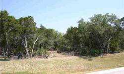 Huge Price Reduction! This more than 1 acre lot offers privacy along the rear lot line. Backing to the Nature Conservancy of Texas land (4000 acre preserve) the buyer will enjoy ultimate privacy! May have views. Property owners membership to the club