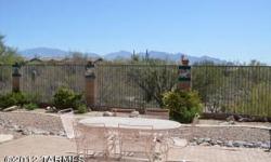 One of the best lots in wonderful Bluffs at Dove Mountain. Terrific East facing Catalina Mountain views highlight this nicely upgraded, split plan, 3 bedroom, den, two bath AF Sterling home. Master suite hosts access to to covered patio, plus his & her
