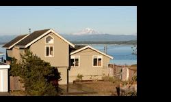 Saltwater Front Home with Full Mother-in-Law Apartment. 3 Bedrooms ? 2 Bathrooms. Nice deck w/Hot Tub. House is situated on a bit of a point -Dynamite Bay & Mt Baker Views. Community features