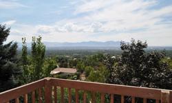 Stunning panoramic, unobstructed views of the entire valley. Unique opportunity to own a home in the coveted Indian Hills neighborhood. Contemporary design, beautiful landscaping, 3 large balconies, and a charming water feature create an alluring