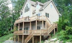 4 bedroom 4 1/2 bath home in the Traders Landing community. Lake view, convenient location in the heart of Deep Creek Lake. Leased boat slip available. Established rental. Call today for more details! Listing agent and office