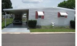 Well-kept 2 Bedroom 2 Bath mobile on the water in a 5-star park where you own your own lot. Mobile has central A/C, newer flooring and interior paint with ceiling fans in all major rooms and a 10'x20' glass-enclosed porch which overlooks the water and