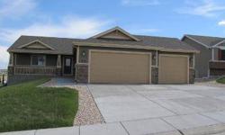 Better than new! this 5 bed, 3 bath, fully finished ranch style plan is based on a vey open concept. Vaulted ceilings; kitchen overlooks the dining and living room area, main floor laundry, gas fireplace, pre-wired surrond sound, stainless steal