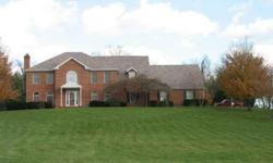 As grand as it gets! All brick home on 1.57 acres w 4 bedrooms, open 2 story foyer and family room, full walkout basement, 2 fireplaces, hardwood floors, sunroom and enormous kitchen w cooktop, wall oven and massive center island. Master bedroom w