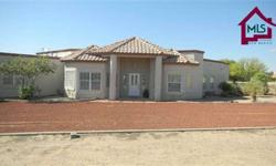 4305 Diamondback is situated on over 1.1 acres in the Las Alturas area. This property offers a 1.165 acre lot, a 2610 SF home and a separate 3 to 4 car garage that is over 700 SF with a half bath. This custom home offers 4 bedrooms, 2 1/2 baths, a Living