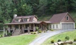 Rural location is the setting for this mountain estate on 12.07 acres. Land is sloping to steep, mostly wooded with small pond and stream running through property. Home has open great room w/stone fireplace, vaulted ceiling, no appliances in kitchen, bd