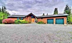 One of a kind retreat on over 18 acres in tranquil Snohomish. Main floor is just under 2000 Sf, and there is a 1275 SF basement- great set up for multi-generational living. Classic NW touches throughout include exposed beams, vaulted ceilings and