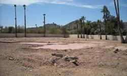 Bank owned 1 acre lot with north/south exposure, views of Camelback Mountain. Buyers must prequalify with Bank of America. Free Credit check and appraisal if financed with BofA. Allows 3 days for a response.Listing originally posted at http