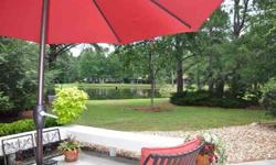 One of Rose Hill Plantation's best lagoon and golf views. Enjoy sitting on your private patio watching golfers across a lagoon putt on the 4th green. Watching the bird activity around the water will also be a joy and a great way to relax at the end of the
