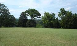 Breath taking view of East Texas from the highest part of this 65.711 acre tract located on FM 2015 off Hwy 271. 30% pasture, the rest wooded. A wide creek runs through the property. There's also a picturesque pond(stocked) nestled down in the woods.Ther
