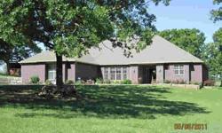 Custom built home with lots of upgrades. 2 living areas, 3 full baths, 3 car garage and covered patio overlooking large valley. Mature Oak trees. 30x40 shop. Easy commute to Tulsa.Listing originally posted at http